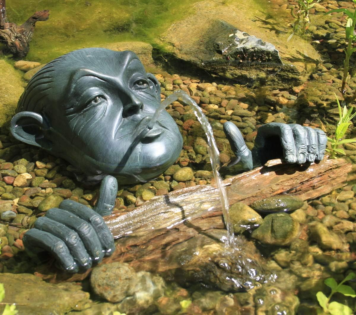 Man in Barrell Spitter Fountain