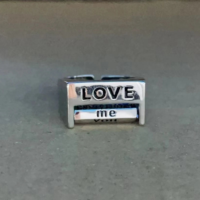 Rotating Message Ring – “FU” or “LOVE”