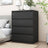 Black four-drawer bedside table
